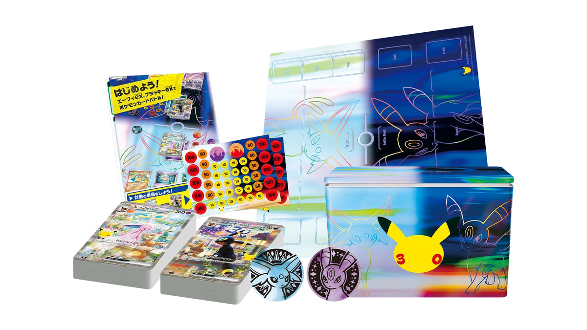 Inhoud van de Japanse 30th Celebration Premium Deck Set Espeon en Umbreon: twee decks, speelmat, blikken deckbox en munten